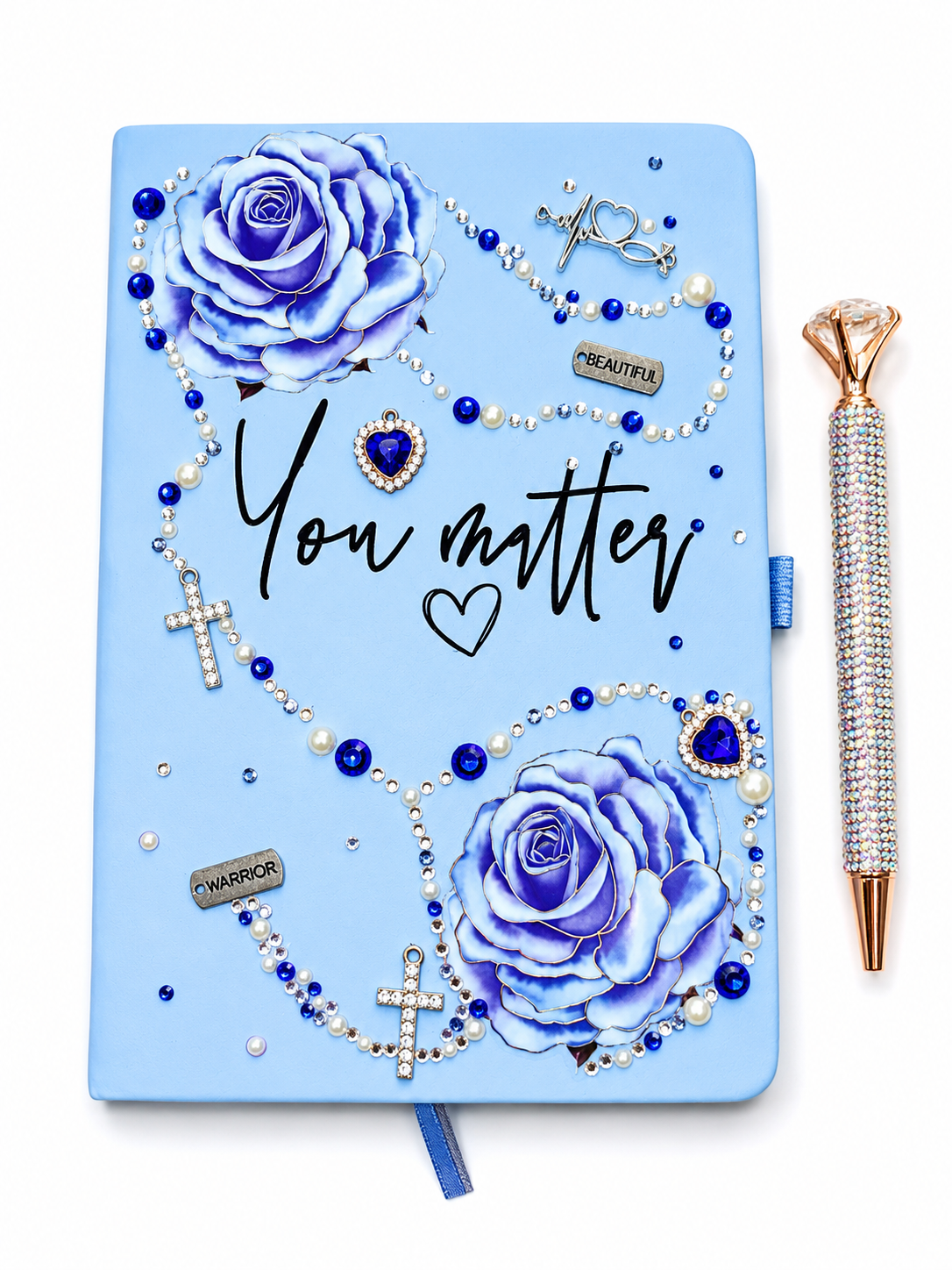 Luxury A5 You Matter handcrafted journal featuring blue roses, crystal rhinestones, pearl embellishments, silver cross charms, and a matching bling pen on a white background.
