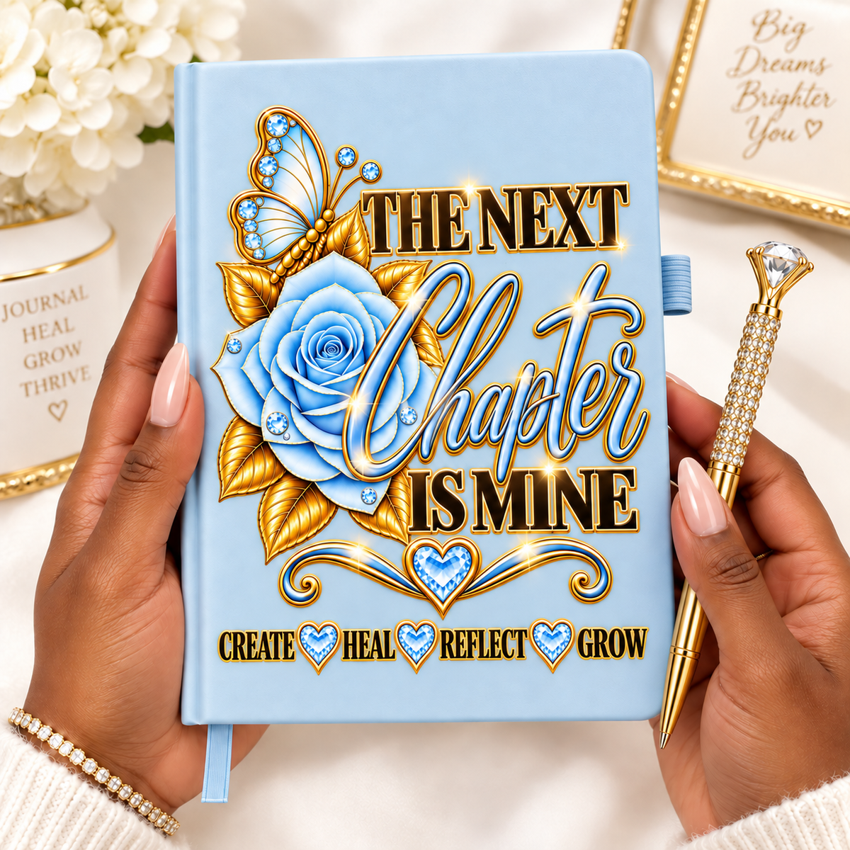 The Next Chapter Is Mine Journal in powder blue with blue rose, jeweled butterfly, gold lettering, and heart accents