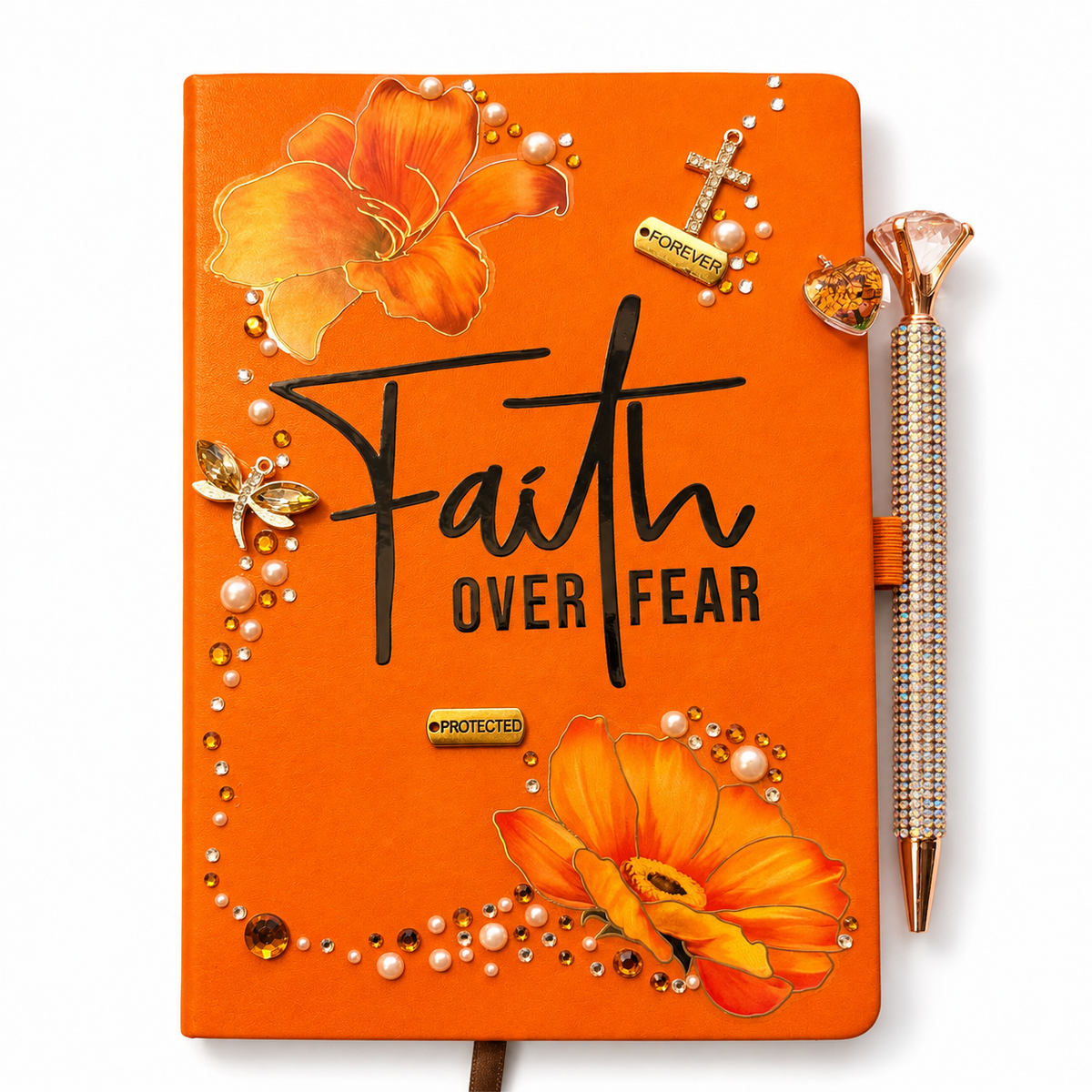 Handcrafted Journals orange hardcover with floral artwork, rhinestone accents, cross charm, and matching beaded pen