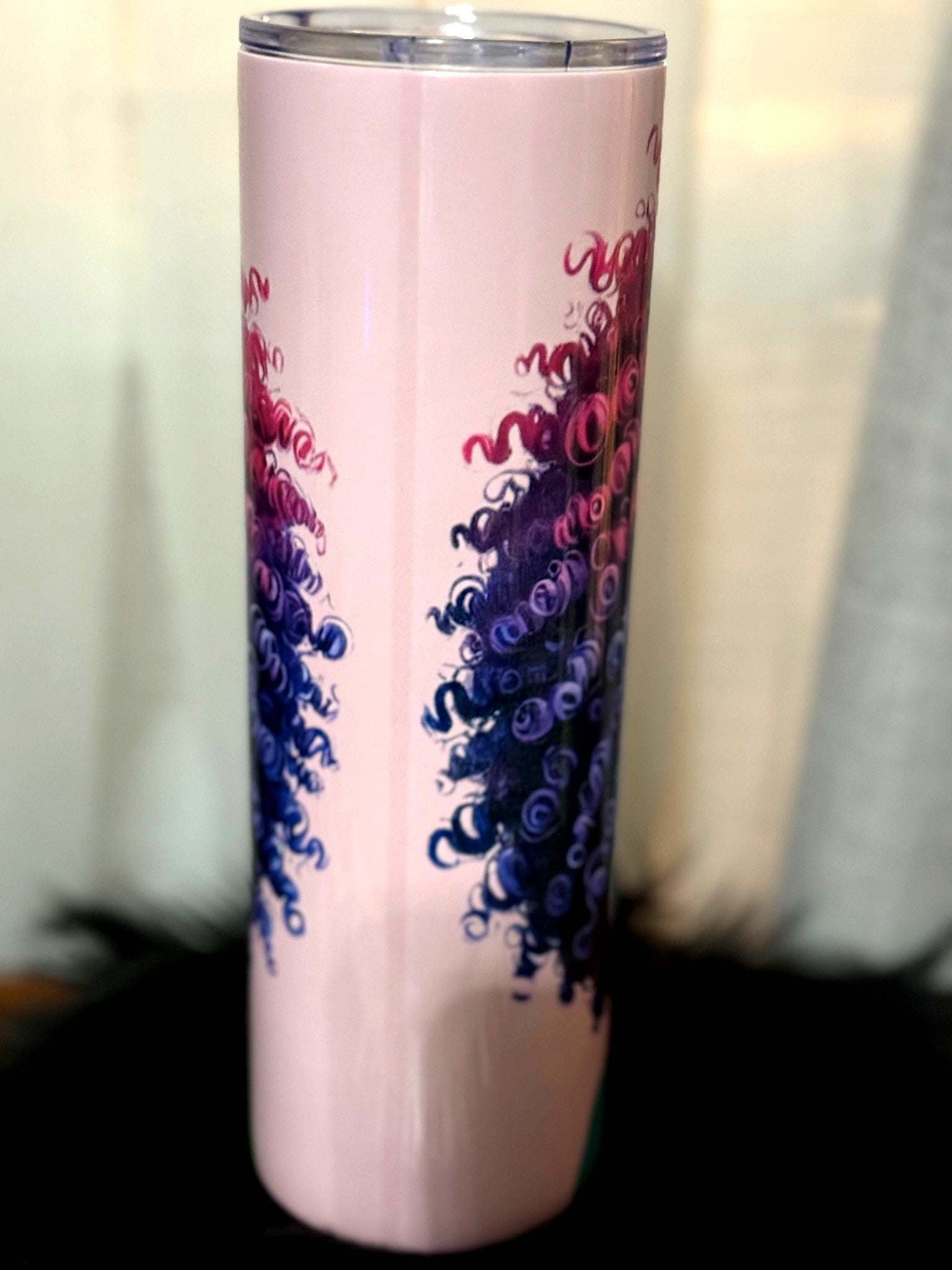 Holographic tumbler with bold female art, part of gift bundle.