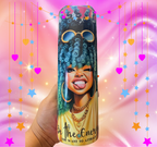 Hand holding a bright pink cup featuring a playful woman with teal textured hair and gold accessories on a dreamy star-filled backdrop.