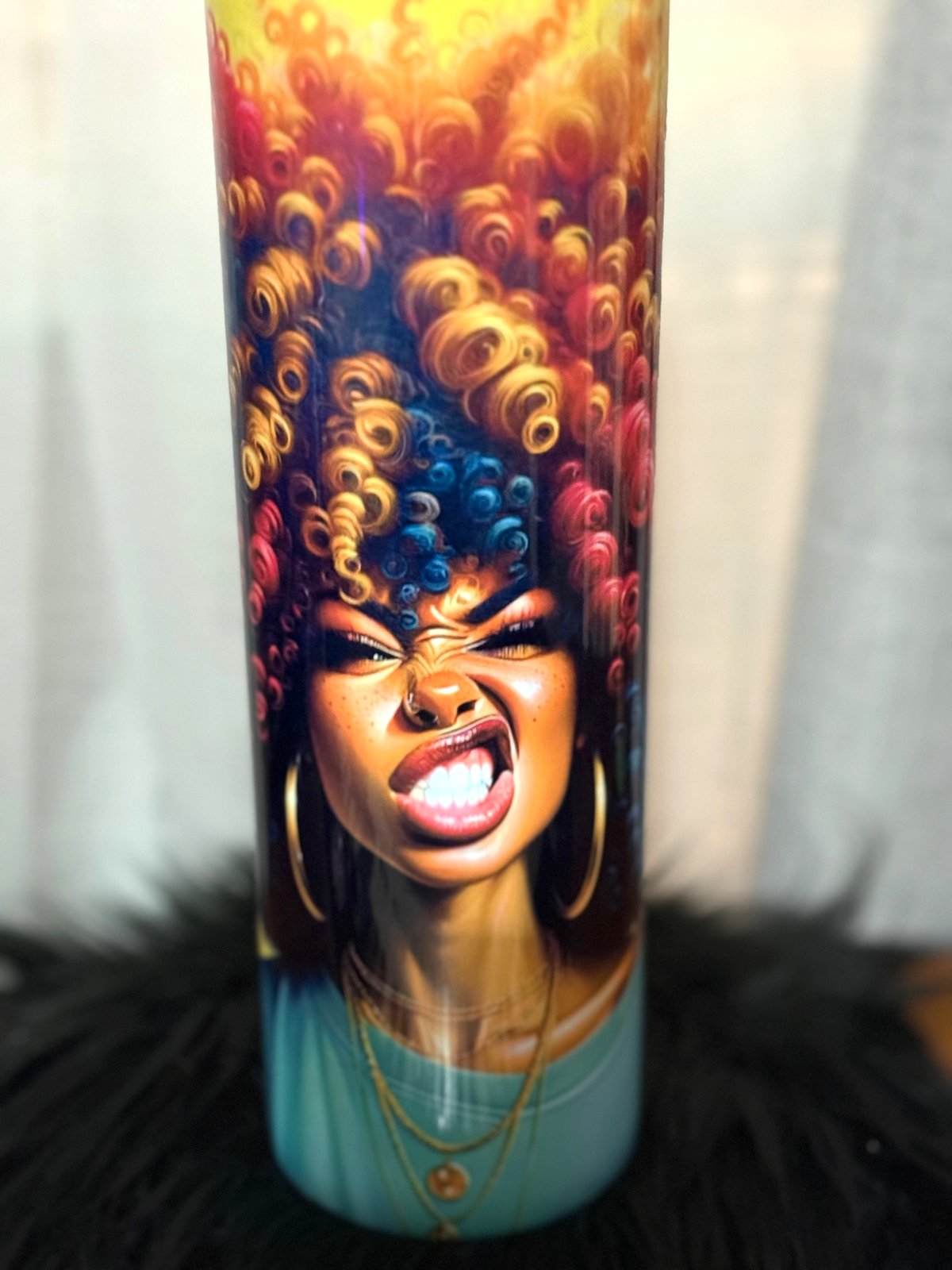 Holographic tumbler with yellow-toned afro girl artwork.