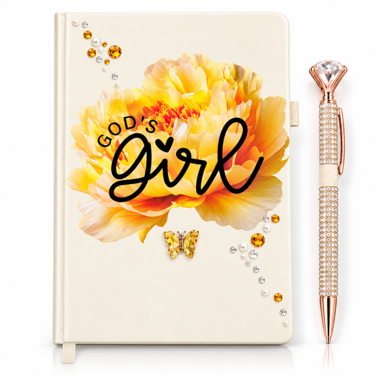 Ivory God’s Girl Journal with cream cover, vibrant yellow-orange floral design, rhinestone accents, butterfly charm, and jeweled pen