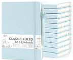 Light blue A5 notebooks with a stack of books on a white background
