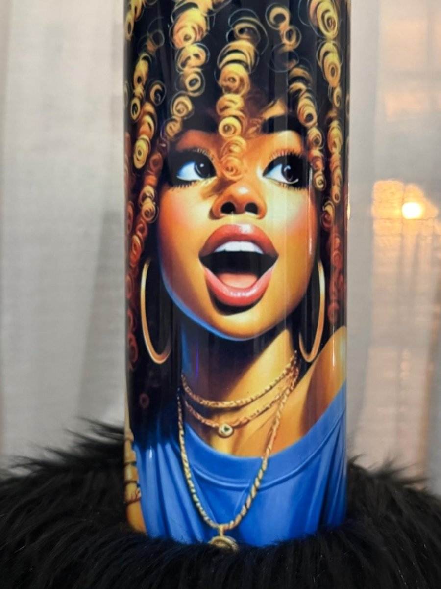 “Holographic box showcasing a stainless steel tumbler featuring matching bold art of a stylish Black woman with red-orange curls and layered jewelry, echoing the journal design.”