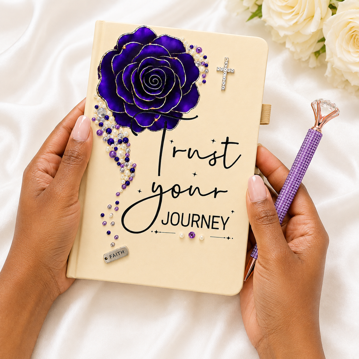purple Christian journal with cream cover, large purple rose, rhinestone cross, pearl accents, and Trust Your Journey lettering