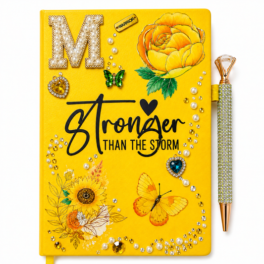 Stronger Than the Storm yellow handcrafted journal with pearl M initial, floral artwork, butterflies, rhinestones, and pen